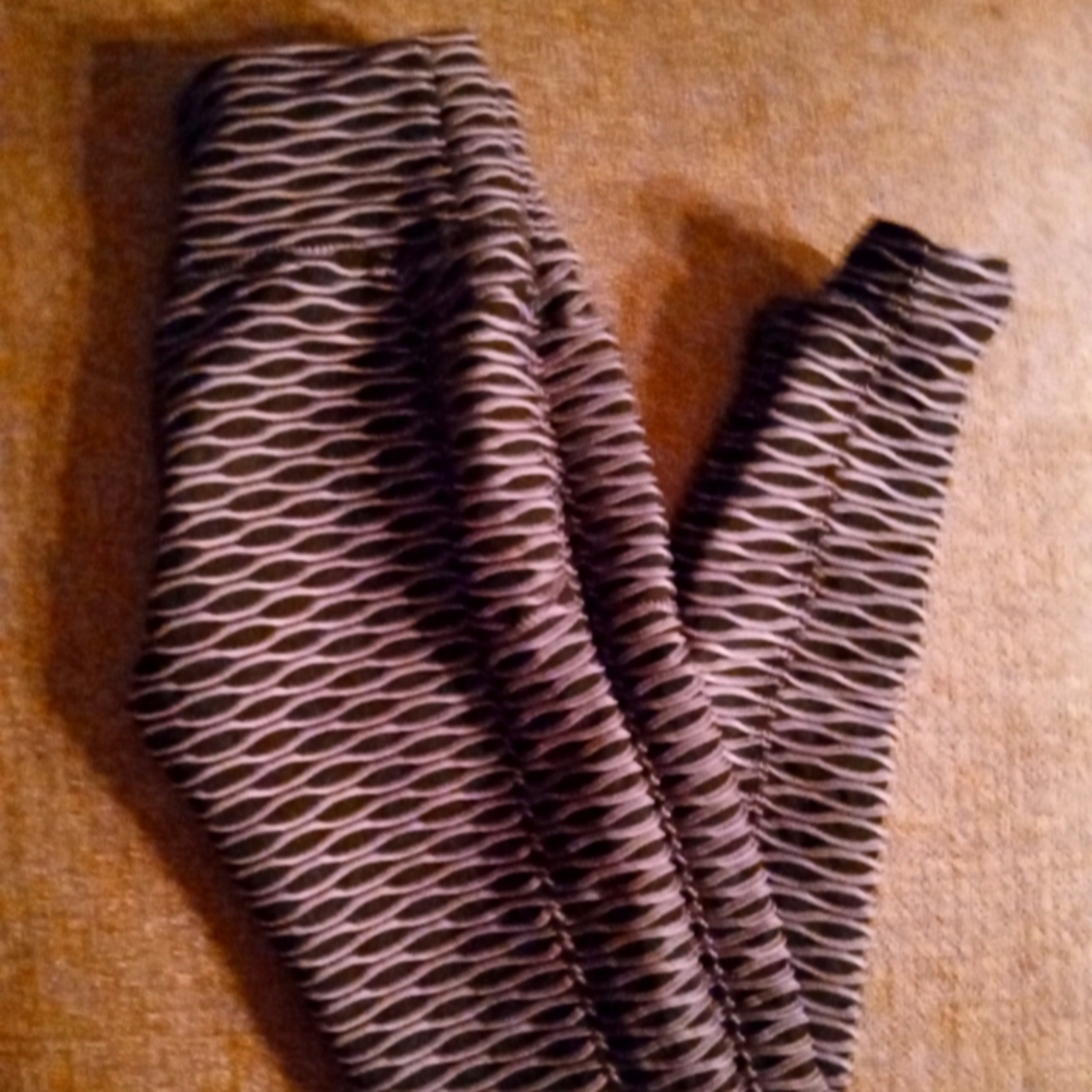 Workout Purple and Black small stretchy leggings.